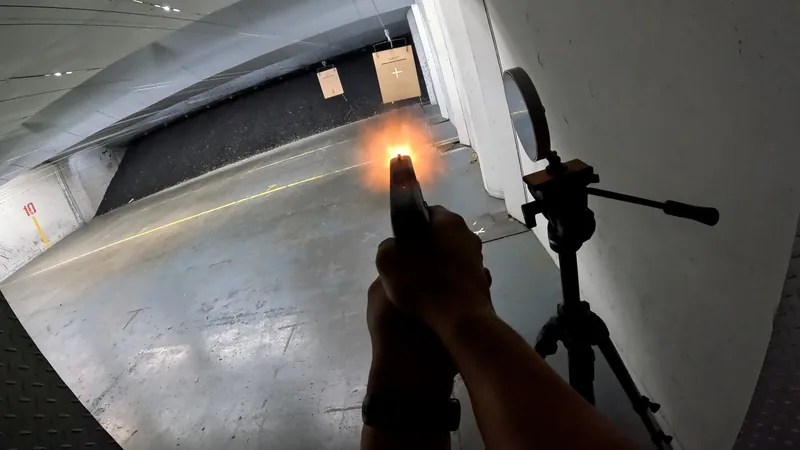 A POV perspective of shooting a gun at a test target