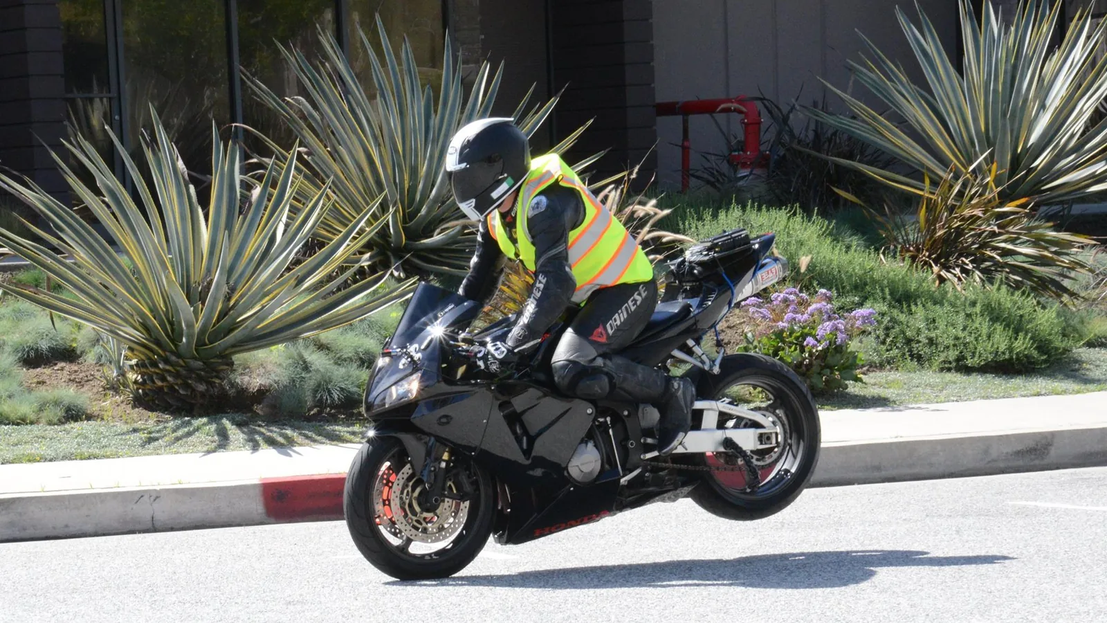A rider on an instrumented motorcycle during a test run